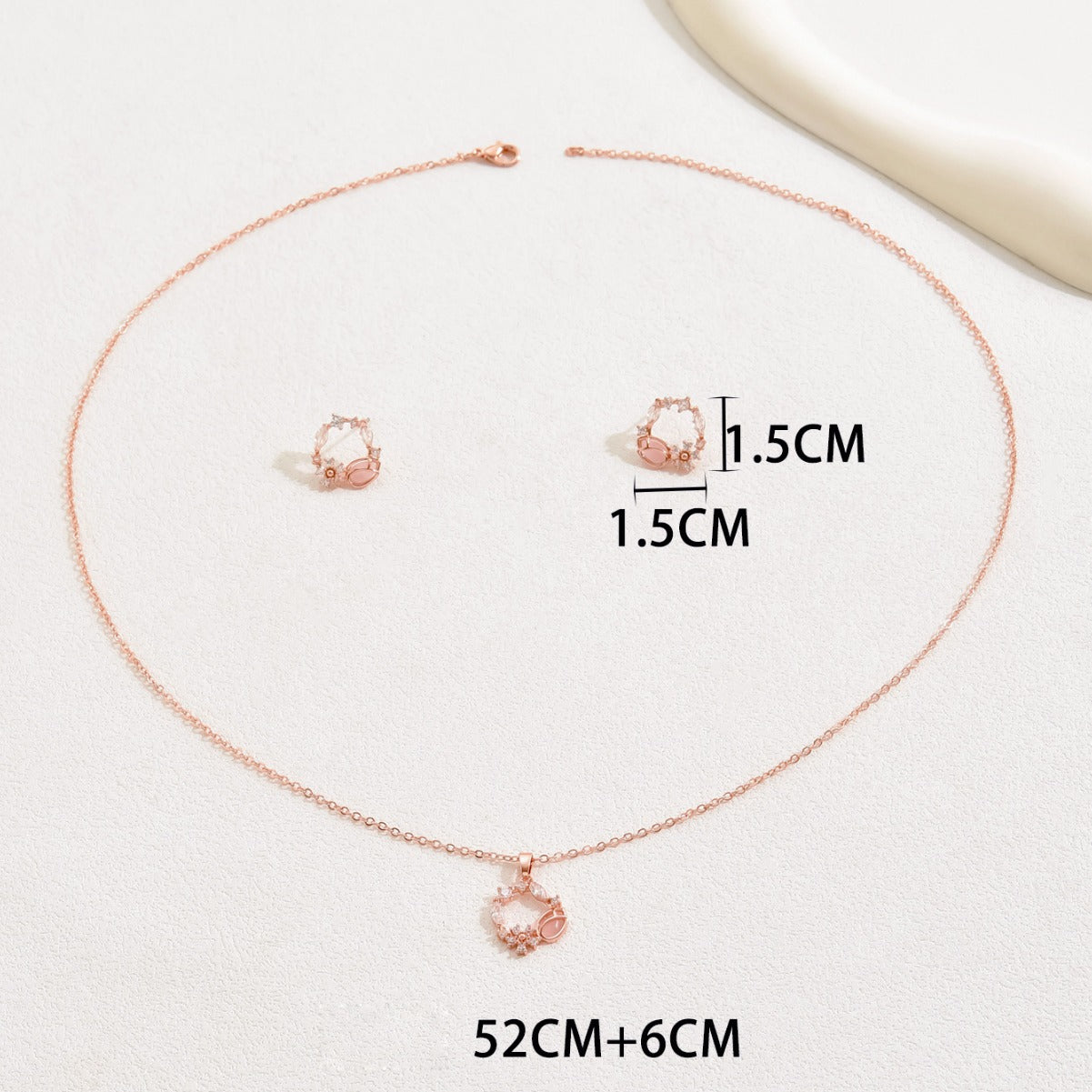 Set di collana e orecchini pendenti floreali minimalisti in rame con intarsio di zirconi da donna