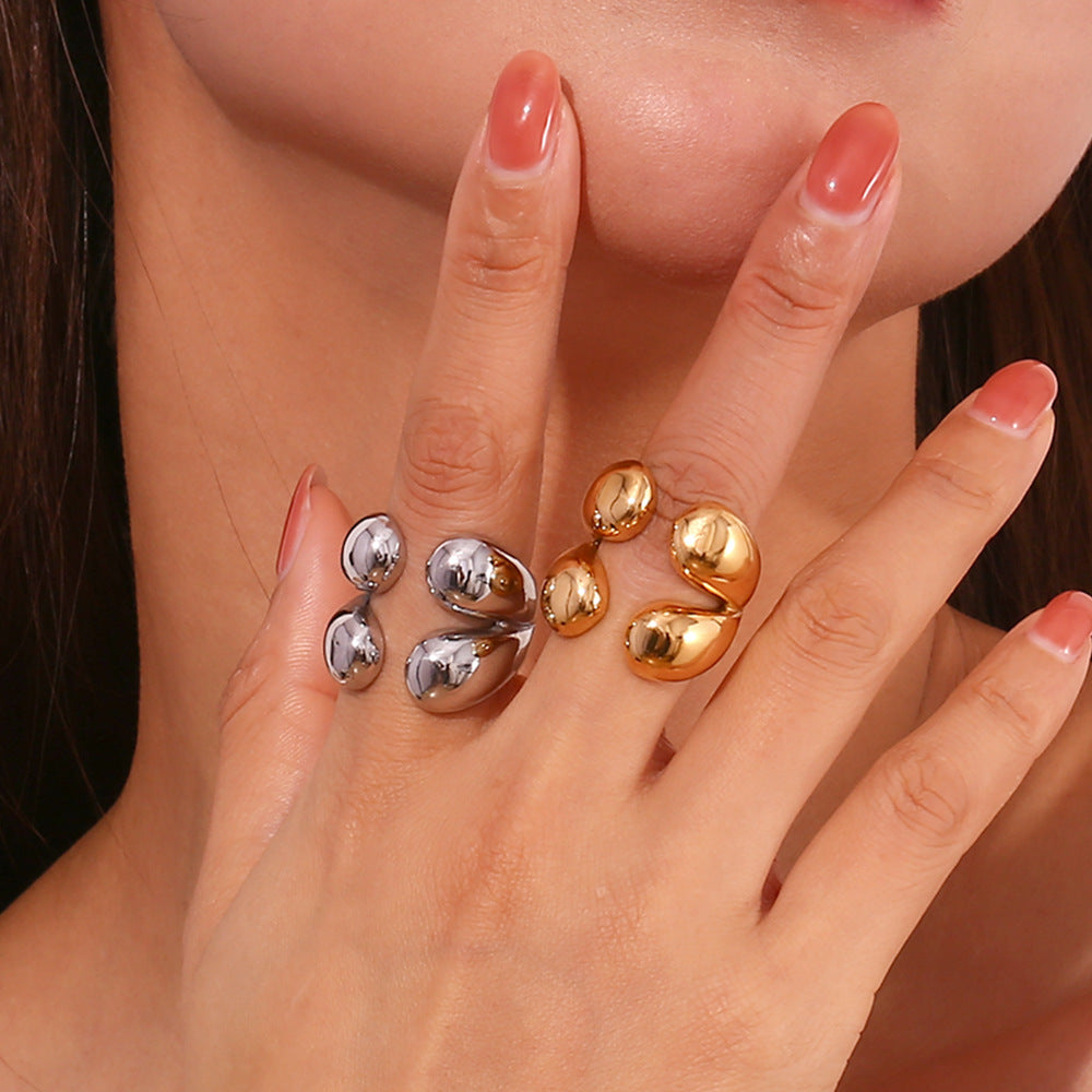 Anillo abierto de acero inoxidable chapado en oro de 18 quilates, estilo minimalista, para mujer, con cuatro formas de lágrima