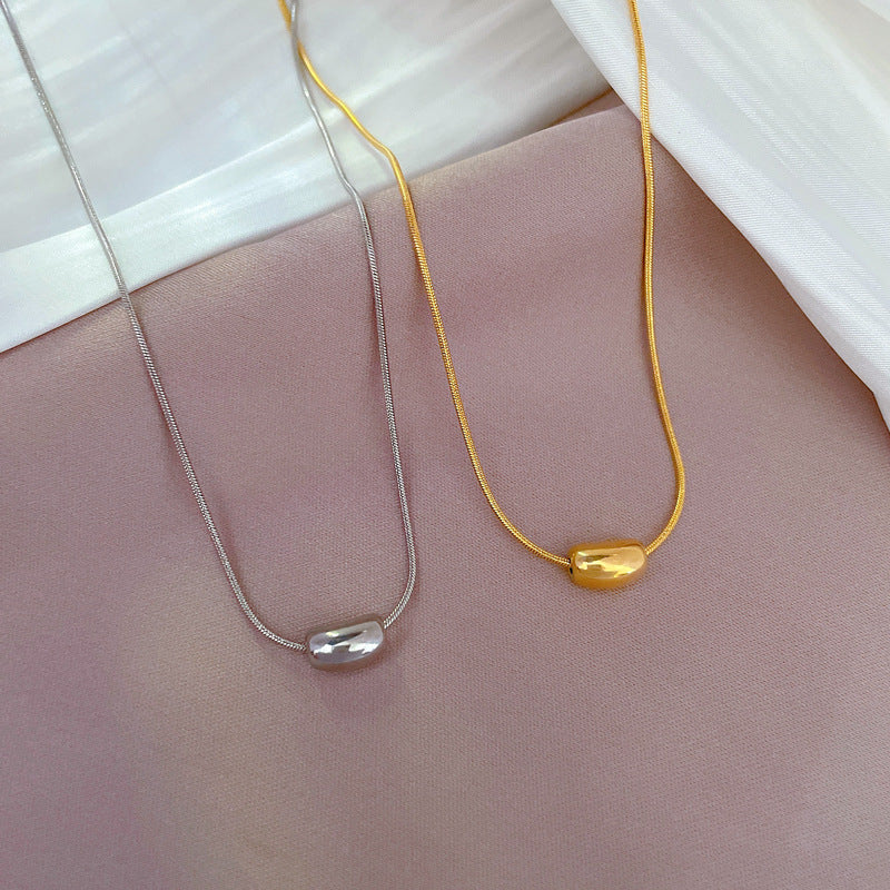 Cartoon Style Geometric Pendant Necklace for Women Made of Titanium Steel with Gold Plating, Clavicle Chain Design Featuring Red Bean Motif