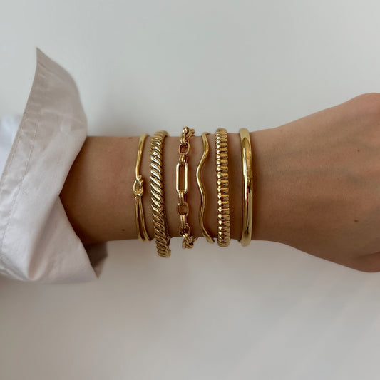 Bracciale ovale minimalista in acciaio inossidabile da donna con finitura placcata, gioiello di lusso