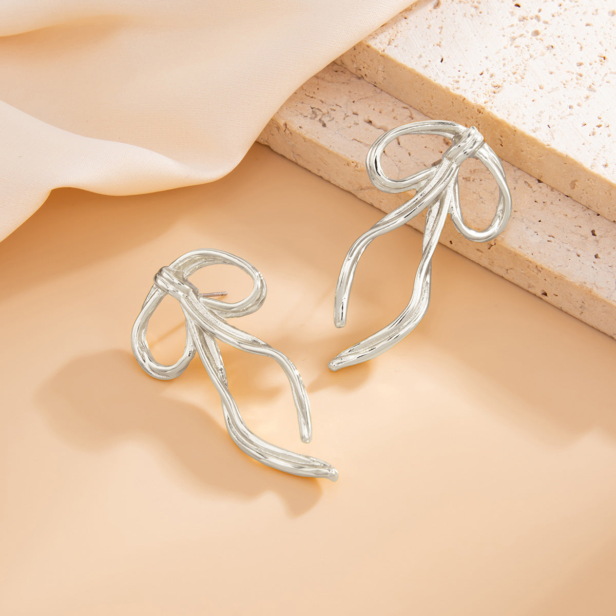 Minimalist Bow-Shaped Alloy Stud Earrings for Women with Electroplated Finish and Stainless Steel Posts