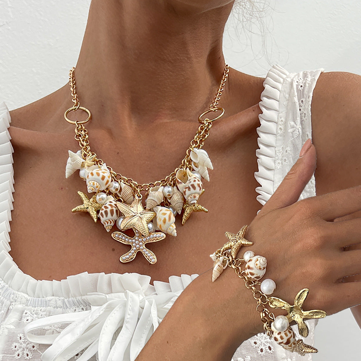 Collana con ciondolo a stella e conchiglia in stile vacanza con dettaglio nappa in lega con finitura placcata per donne e uomini