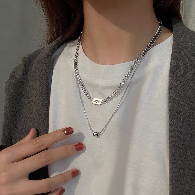 Collana Doppia Strato Minimalista con Perline Rotonde Geometriche da Donna, in Acciaio al Titanio, con Catena Cubana e Finitura Placcata