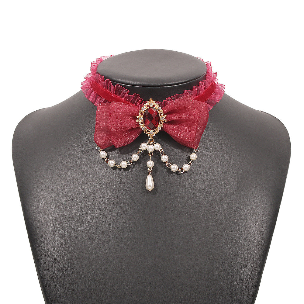 Collar de nudo de lazo geométrico dulce y atrevido con base de aleación, colgante de imitación de perla y detalles de estrella-luna para mujer