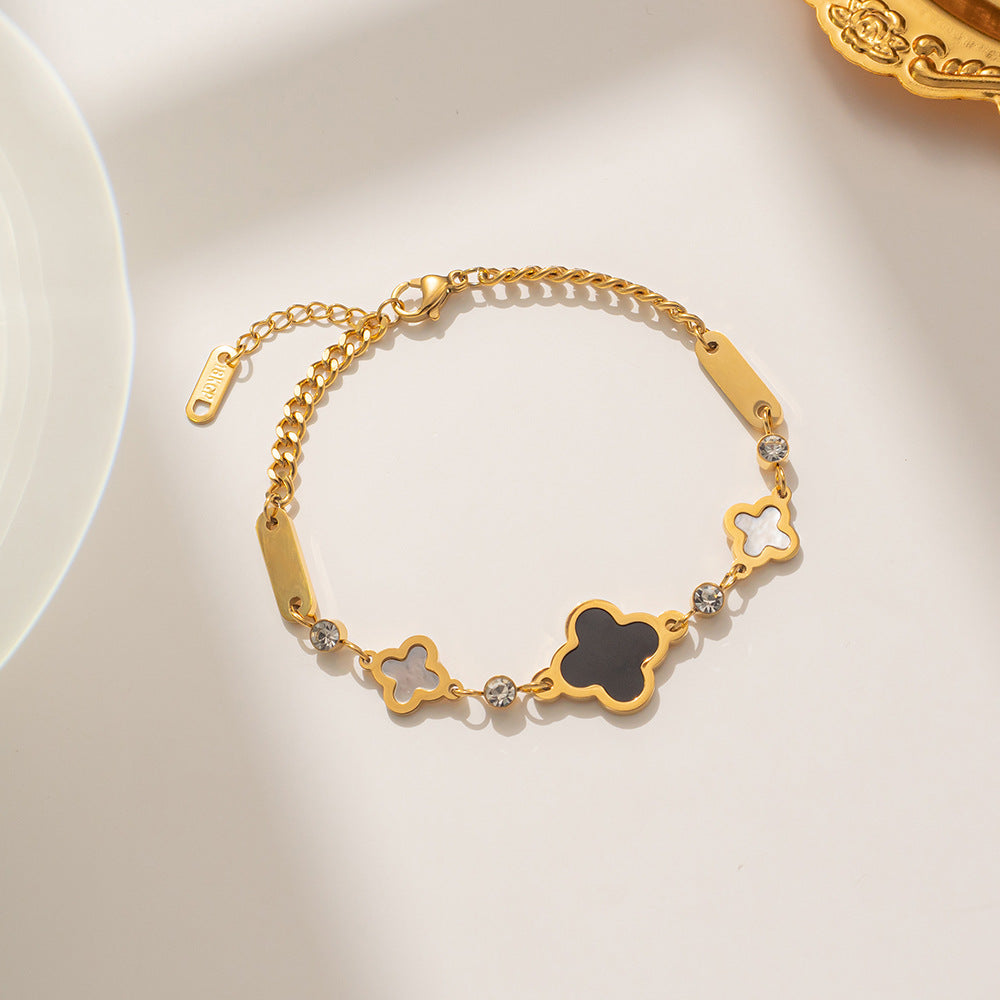 Pulsera geométrica de trébol de cuatro hojas de acero titanio con baño de oro rosa de 18K para mujer