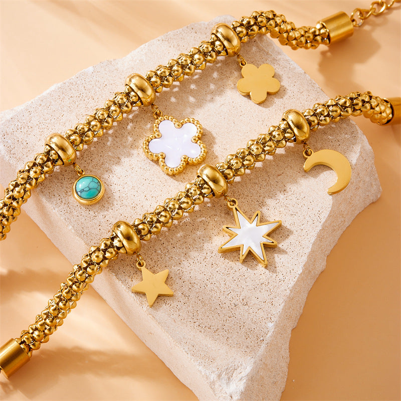 Bracciale alla moda vintage in acciaio inossidabile placcato oro con ciondolo a forma di fiore, luna, stella e turchese per donna