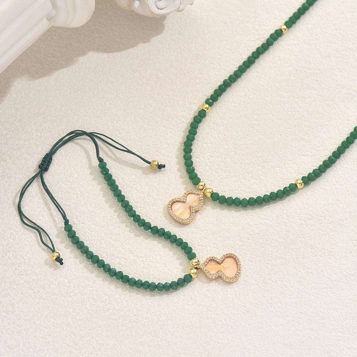 Juego de collar y pulsera de cobre con forma de calabaza minimalista de moda con incrustaciones de circonitas para mujer