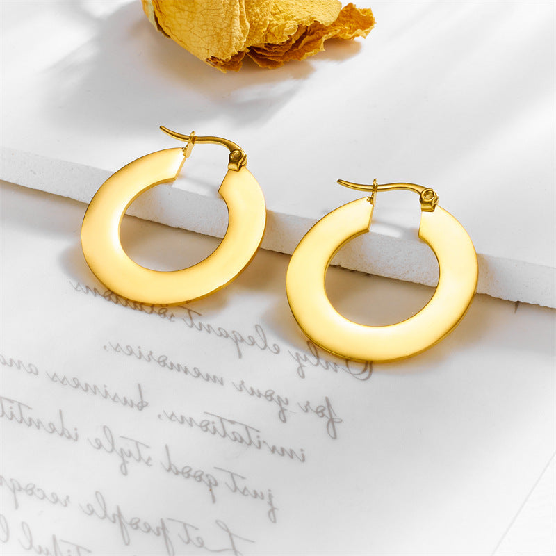 Minimalist Geometric Stainless Steel Hoop Earrings with Polished Finish and Cool-Tone Aesthetic