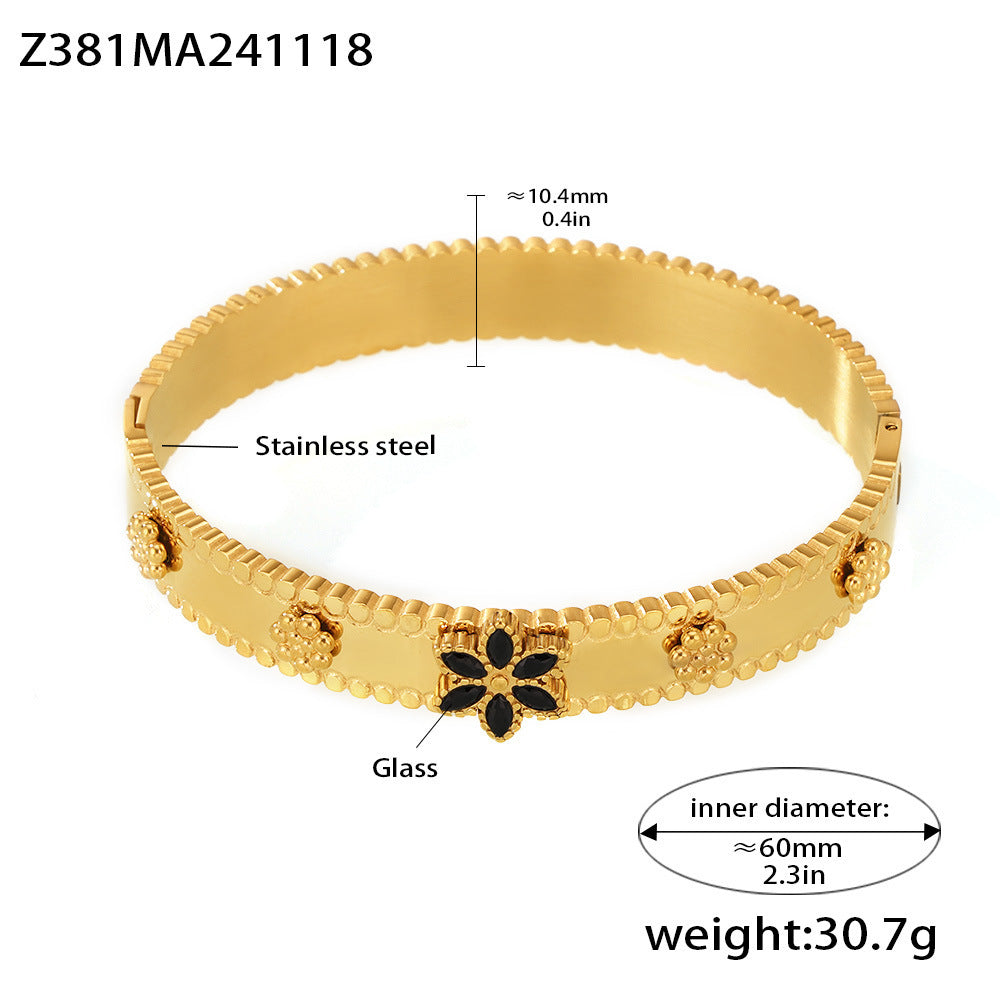 Pulsera de acero inoxidable con forma de copo de nieve y rueda de la fortuna, con incrustaciones de circonita y chapado en oro de 18 quilates.