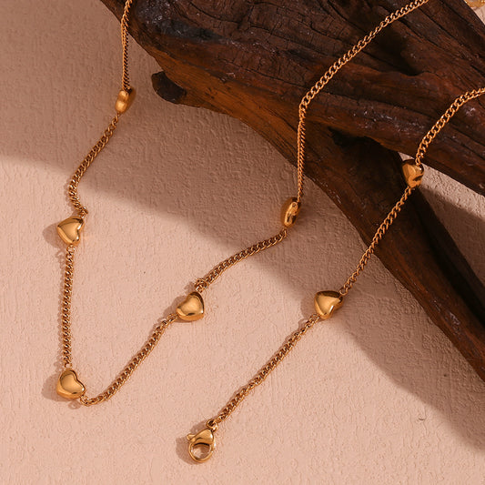 Set collana e bracciale da donna in acciaio inossidabile placcato oro 18 carati a forma di cuore, alla moda