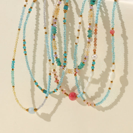 Collar de acero de titanio con abalorios de piedra natural azul geométrica de lujo con colgante de perla de agua dulce y acabado galvanizado