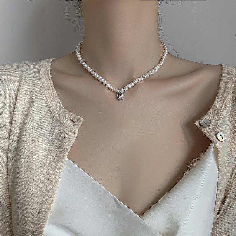 Minimalist Cold-Tone Pearl Pendant Necklace with Geometric Teardrop Charm on O-Chain for Women
