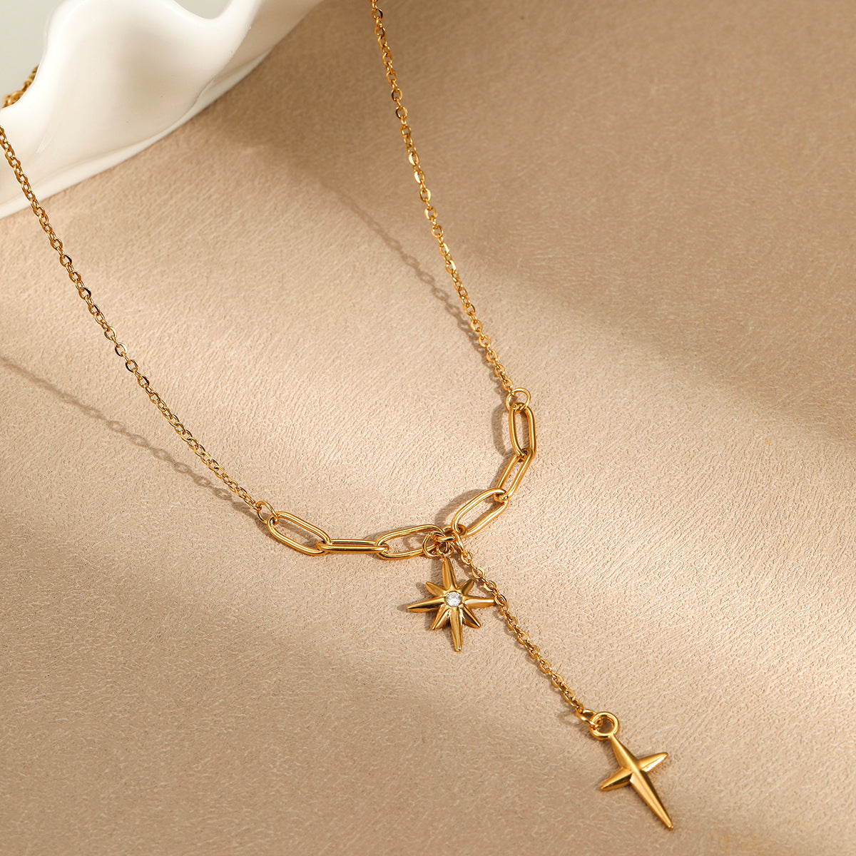 Minimalist Clavicle Necklace with Eight-Pointed Star Pendant, Rhinestone Inlay, Stainless Steel, Plated Finish, Tassel and Cross Accents