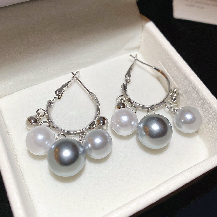 Orecchini da donna vintage eleganti a forma di stella geometrica con perle simulate e zirconi, perni in acciaio placcato