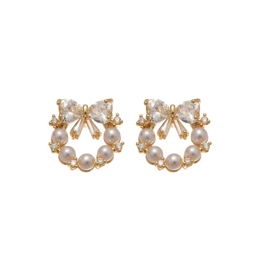 Pendientes elegantes de perlas en forma de lazo con incrustaciones de circonita para mujer, uso diario minimalista de lujo
