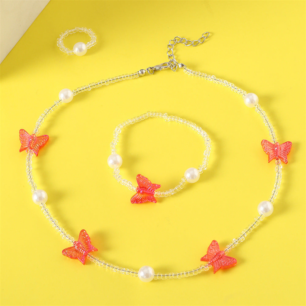 Precioso collar de resina con forma de mariposa para niñas con detalles de perlas, cadena de cuentas redondas, estilo princesa, para mayores de 6 años
