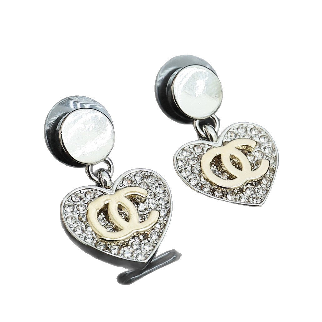 Orecchini da donna placcati oro in ottone con zirconi cubici a forma di cuore, perni in argento sterling 925