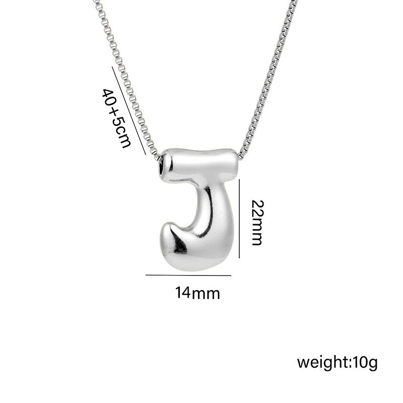 Collar con colgante de acero titanio con forma de letra minimalista y chapado en oro para mujer