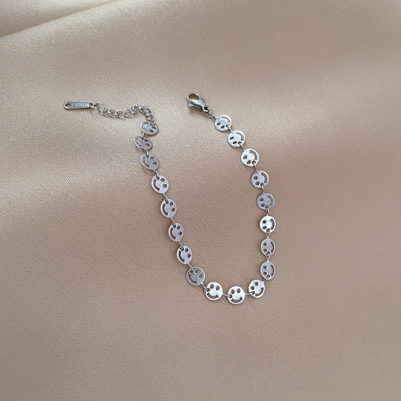 Minimalist Titanium Steel Smiley Face Chain Bracelet for Women with Gold Plating and Wavy Texture Design