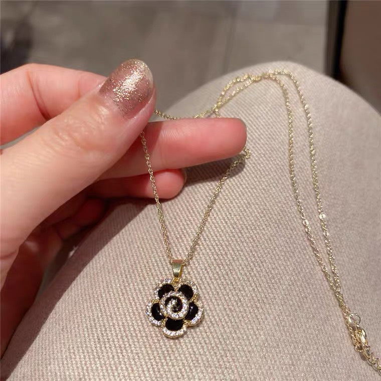 Elegant Camellia-Shaped Pendant Necklace in Titanium Steel with Gold Plating and Zircon Accents for Women