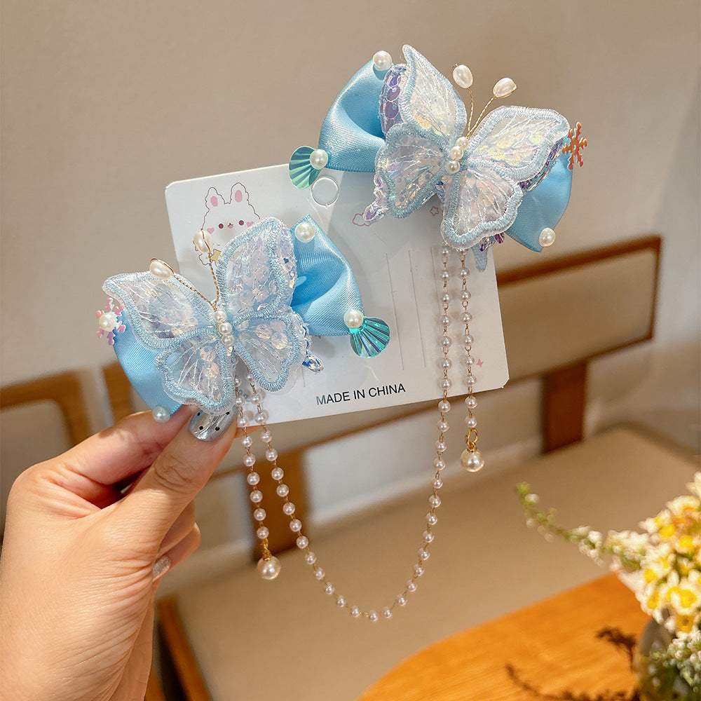 Lindos clips de pelo con diseño de mariposa estilo princesa para niñas con detalles de perlas y borlas, diseño de lazo de tela, set de pinzas laterales hecho a mano para niñas