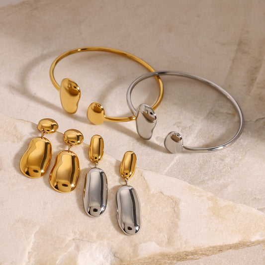 Set di bracciale e orecchini a goccia in acciaio inossidabile asimmetrico e minimalista con finitura placcata
