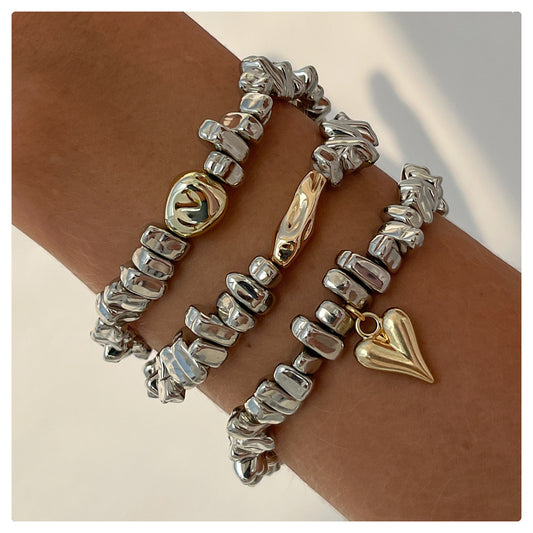 Pulsera de Cuentas Geométricas con Corazón Individualista y Borlas para Mujer