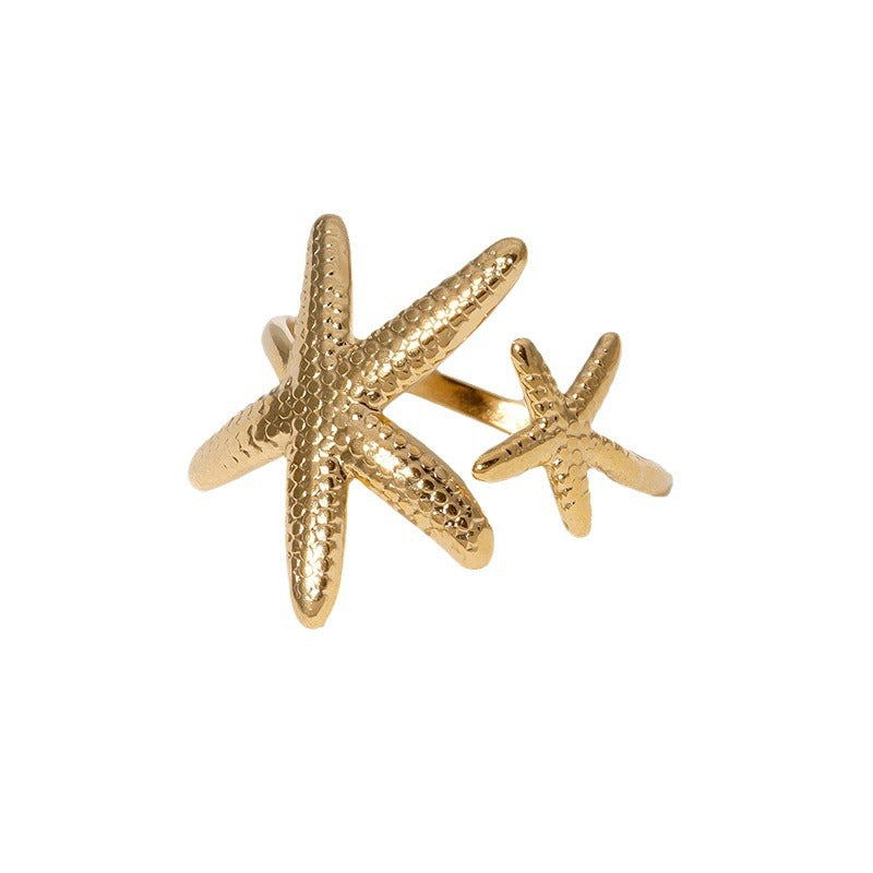 Elegante anello regolabile da donna in acciaio inossidabile a forma di stella marina con finitura placcata, gioiello da spiaggia ispirato all'oceano