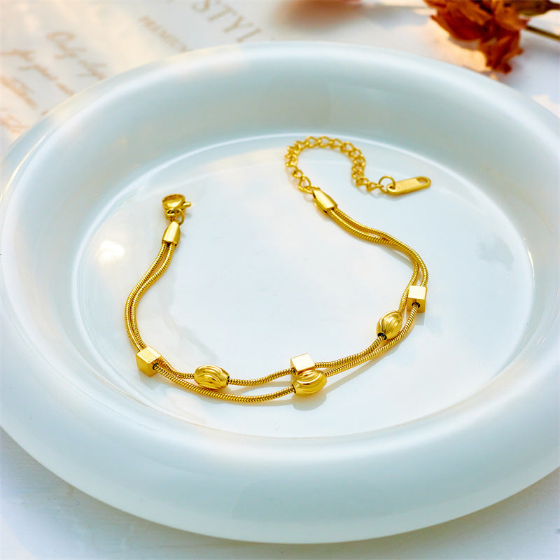 Pulsera minimalista de acero de titanio chapado con doble capa geométrica irregular para mujer
