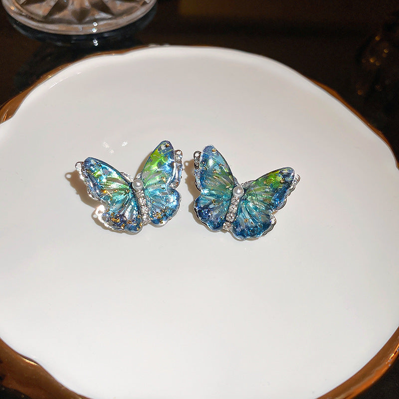 Orecchini floreali delicati con perni in argento, borchie in rame elettrolitico con nappe fluenti, estetica fresca e dolce per donna