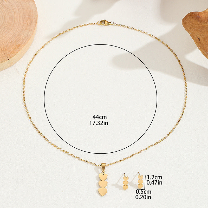 Conjunto de collar y pendientes chapados en cobre con forma de corazón minimalista y borlas para mujer