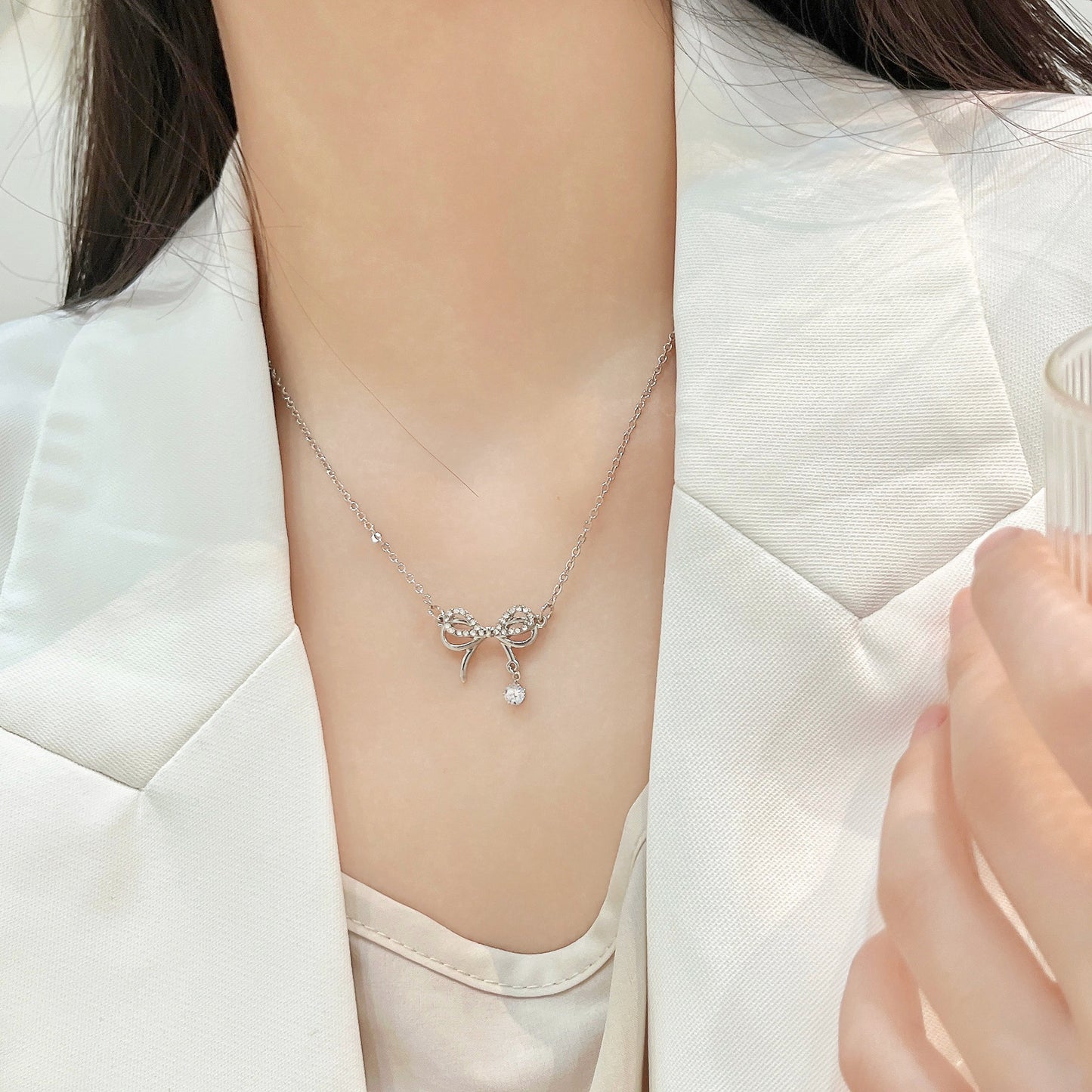 Bow-shaped Zirconia Clavicle Necklace for Women in Titanium Steel with Inlay Craftsmanship, Minimalist and Elegant Design