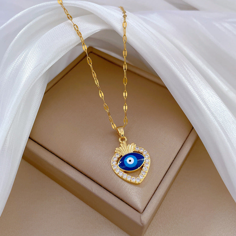 Collana con ciondolo in acciaio al titanio di lusso con motivo geometrico a occhio di Allah e strass, a forma di luna, unisex