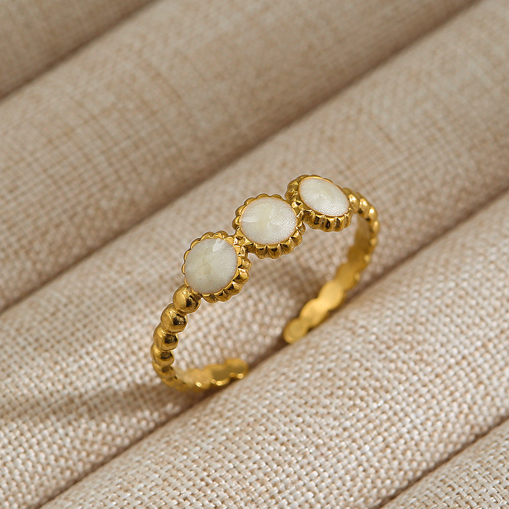 Anillo de acero de titanio con forma de U, estilo punk, chapado en oro de 18 quilates y detalles de microincrustaciones de piedra de lava ovalada