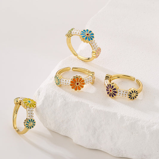 Anello bohémien da donna con forma geometrica irregolare in rame placcato oro e smalto con design floreale