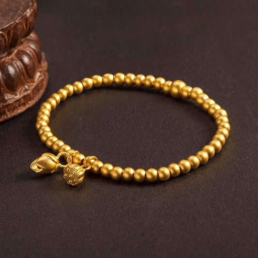 Bracciale con perline a forma di baccello e fiore di loto geometrico in stile lusso leggero, in metallo color oro e argento con cordino elastico