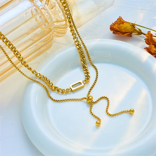 Collana minimalista regolabile a due livelli con finitura placcata in acciaio al titanio, ispirata alla Corea