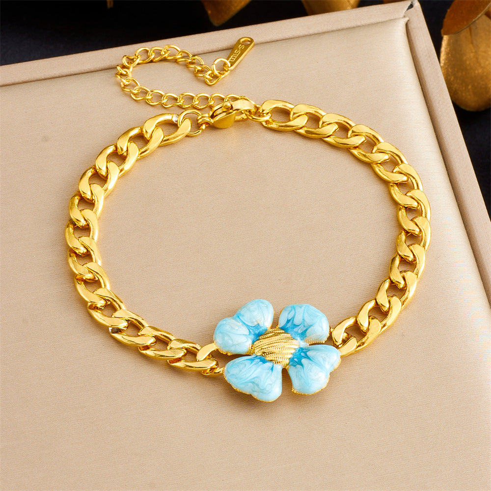 Bracciale con ciondolo floreale e a cuore in stile vintage in acciaio inossidabile con finitura placcata da donna
