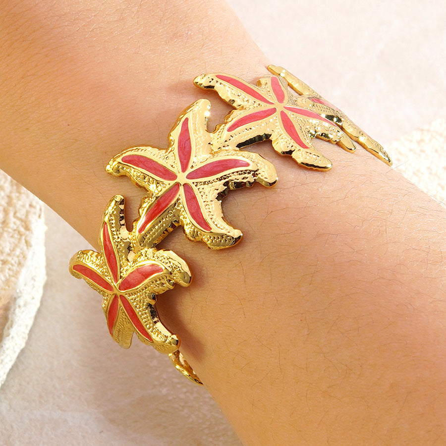 Elegante Bracciale a Polsino in Acciaio Inossidabile con Stella Marina e Goccia d'Olio