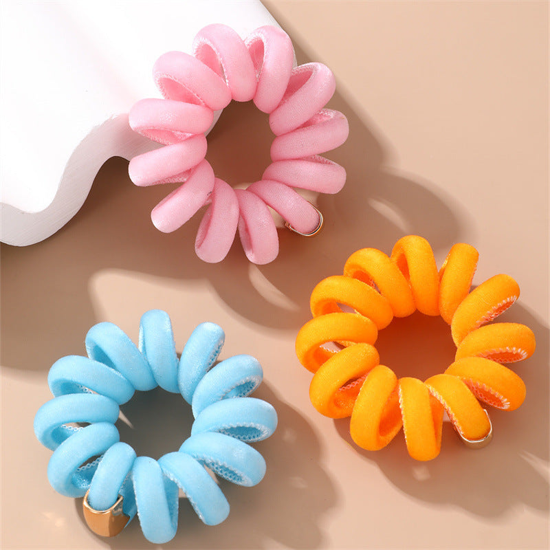 Cuerda de pelo minimalista con estampado de margaritas para niños con textura de punto y forma geométrica