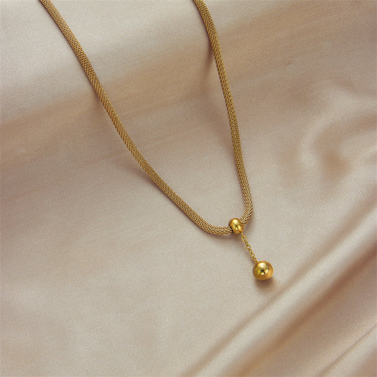Collana pendente minimalista a cilindro cavo in acciaio al titanio con perle dorate e nappe per donna