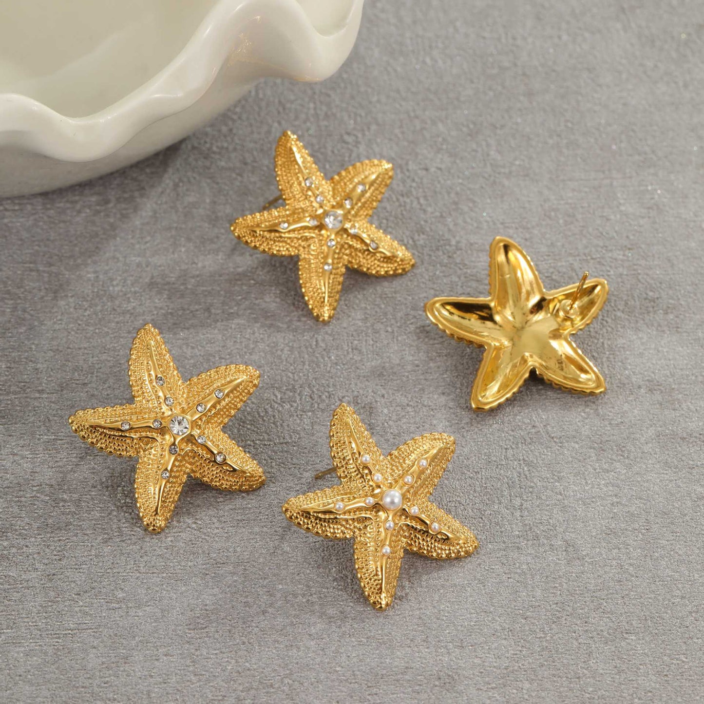 Aretes de acero inoxidable con forma de estrella de moda, incrustaciones de circonita y perlas para mujer