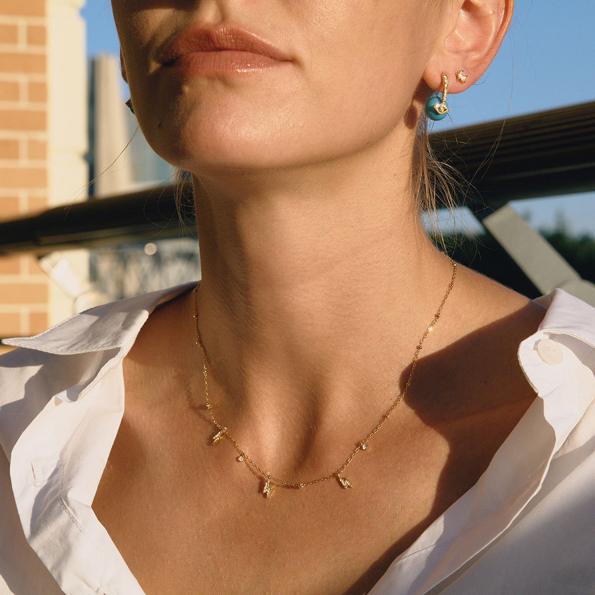 Collana Minimalista in Acciaio al Titanio a Forma di Cuore e Stella da Donna con Intarsio di Strass e Finitura Placcata