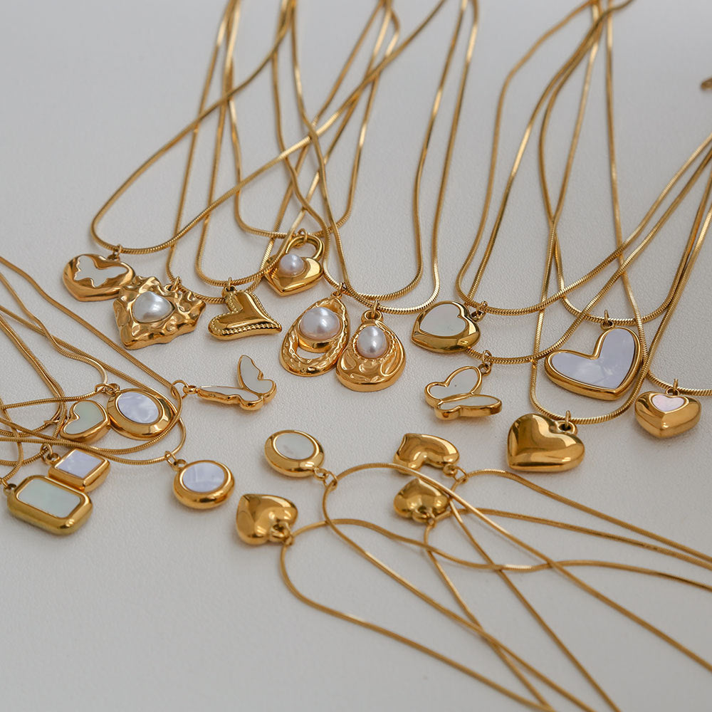 Collar minimalista de acero de titanio con forma de corazón, chapado en oro, perla y cadena ajustable para mujer