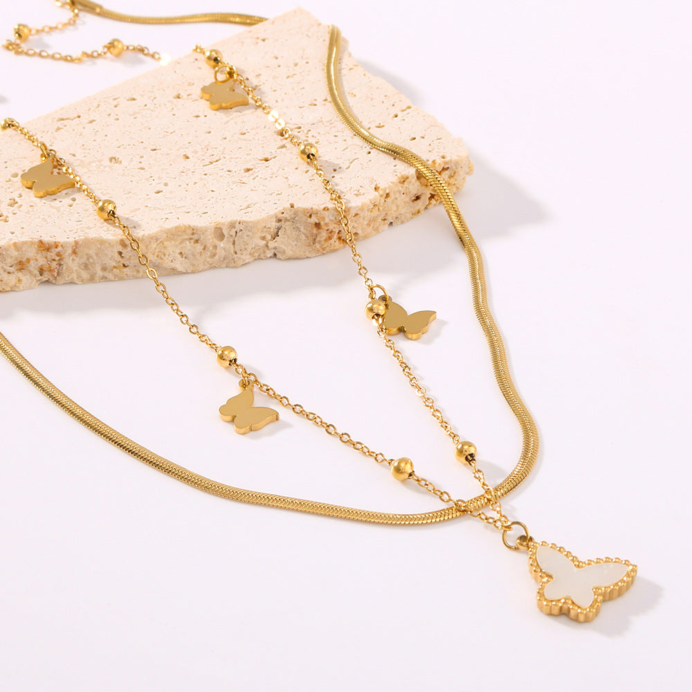 Collana Farfalla Minimalista a Doppio Strato con Catena in Acciaio Inossidabile e Ciondolo in Abalone Bianco