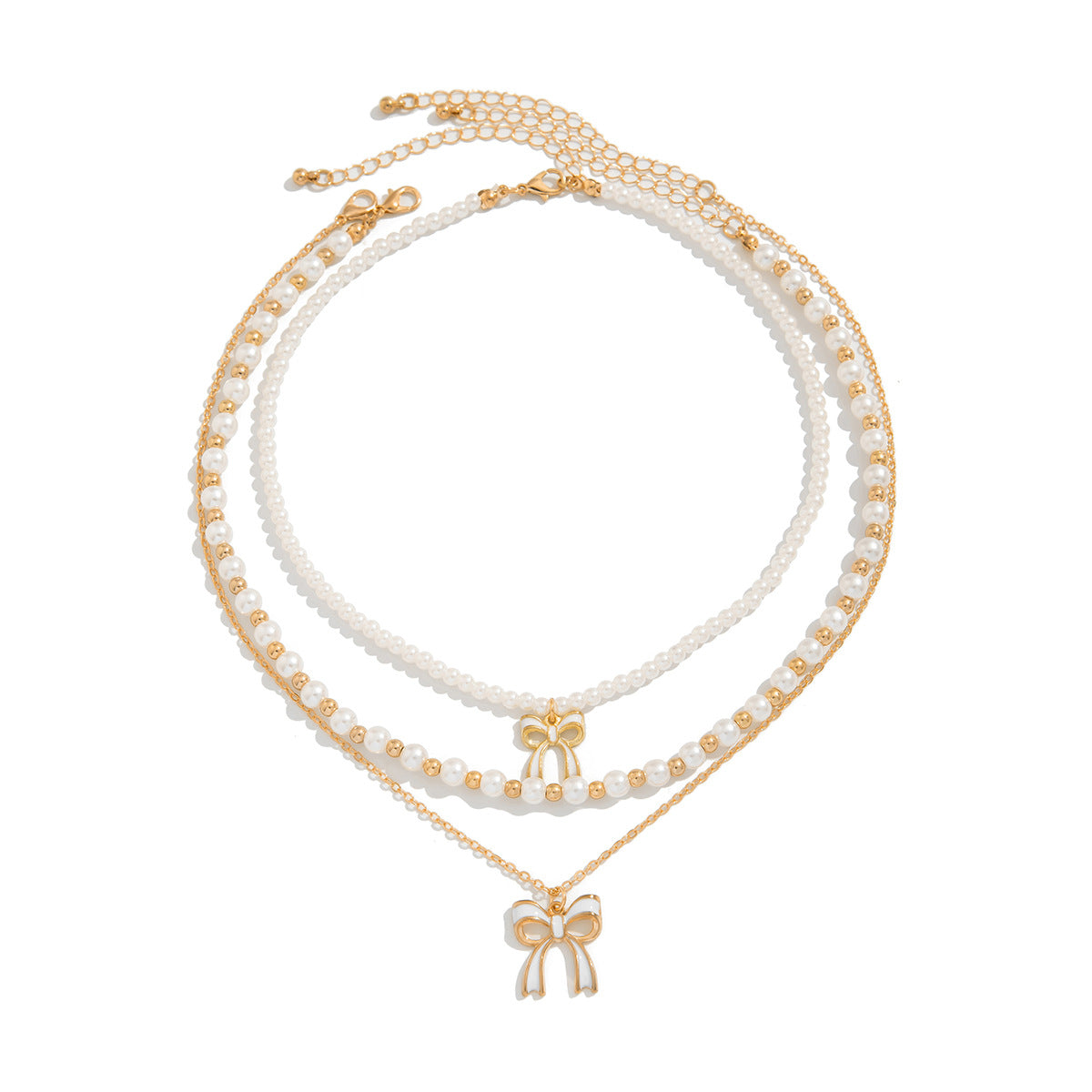 Graziosa collana pendente a forma di fiocco con dettaglio nappa, perla sintetica e lega, finitura placcata, stile a strati da donna