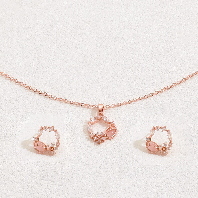 Set di collana e orecchini pendenti floreali minimalisti in rame con intarsio di zirconi da donna