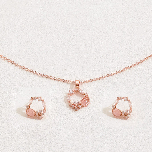 Set di collana e orecchini pendenti floreali minimalisti in rame con intarsio di zirconi da donna
