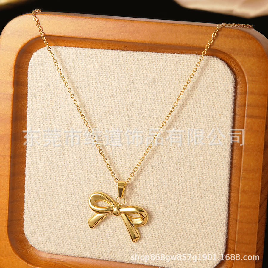 Set collana e orecchini a stella marina con fiocco conchiglia smaltato in acciaio inossidabile e titanio con catena a cavo per donna