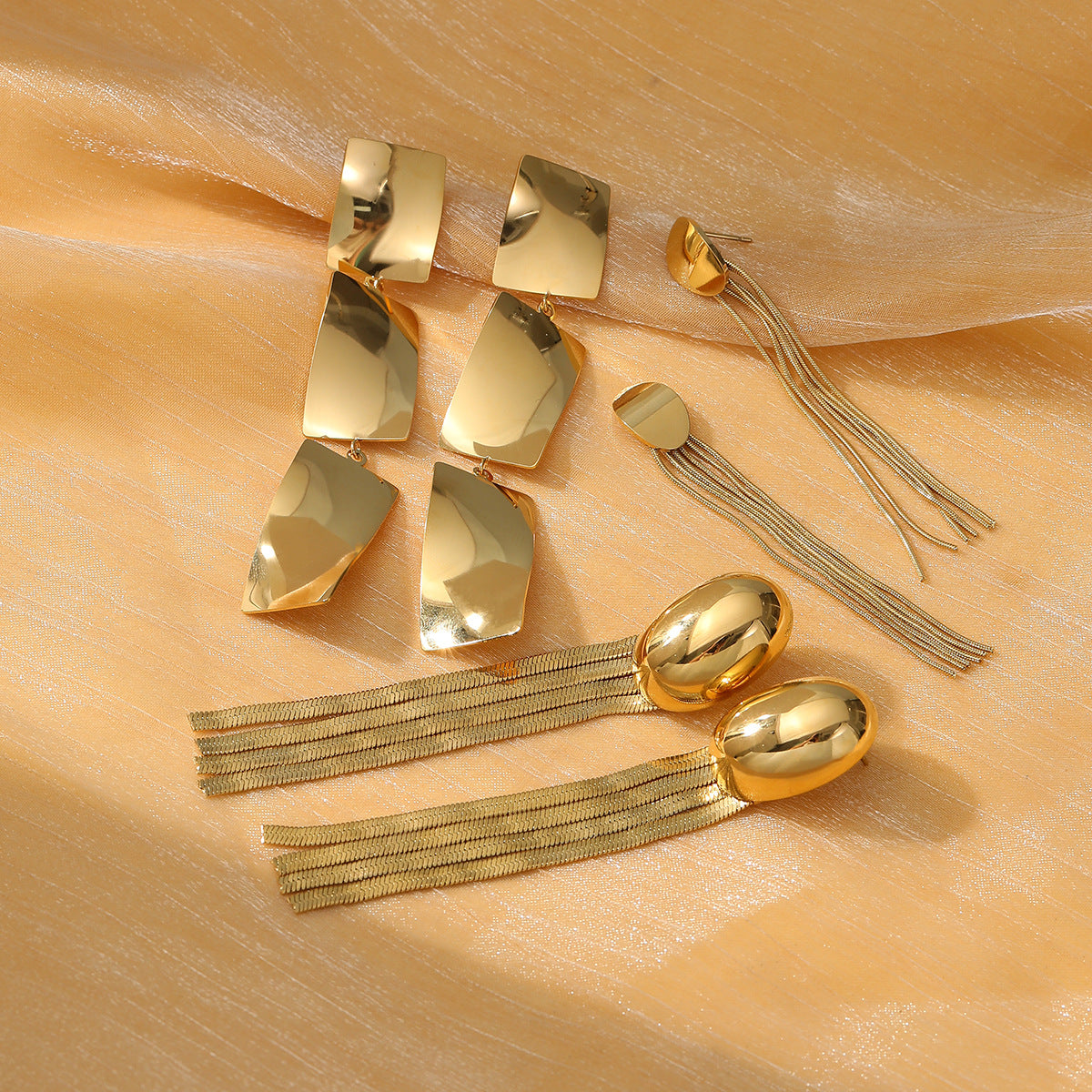 Pendientes de aro irregulares de acero y titanio para mujer con acabado chapado, joyería de lujo ligera, moderna y apta para la oficina